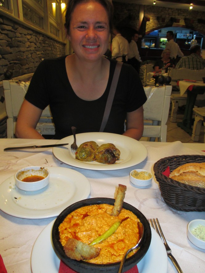 Enjoying stuffed peppers and fergese (a local specialy that is a ricotta-like cheese mixed with tomotoes, meat, and spices)