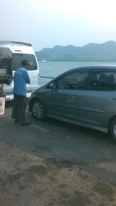 Other cars getting loaded onto the ferry